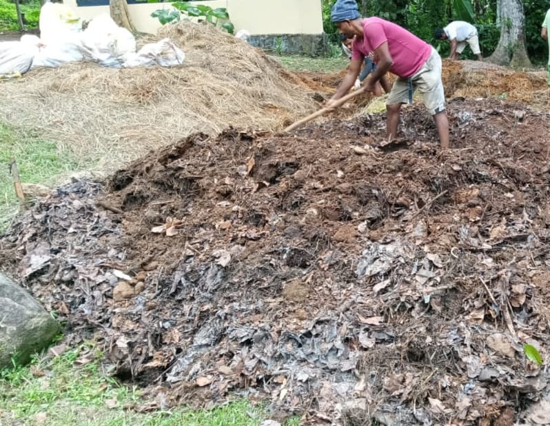 Manual Mixing of Compost